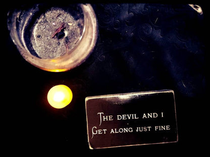 The devil and I box sign