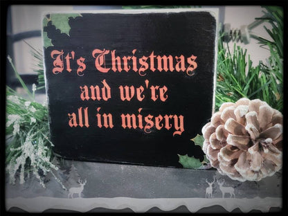 Christmas misery box sign