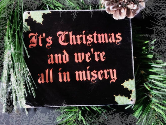 Christmas misery box sign