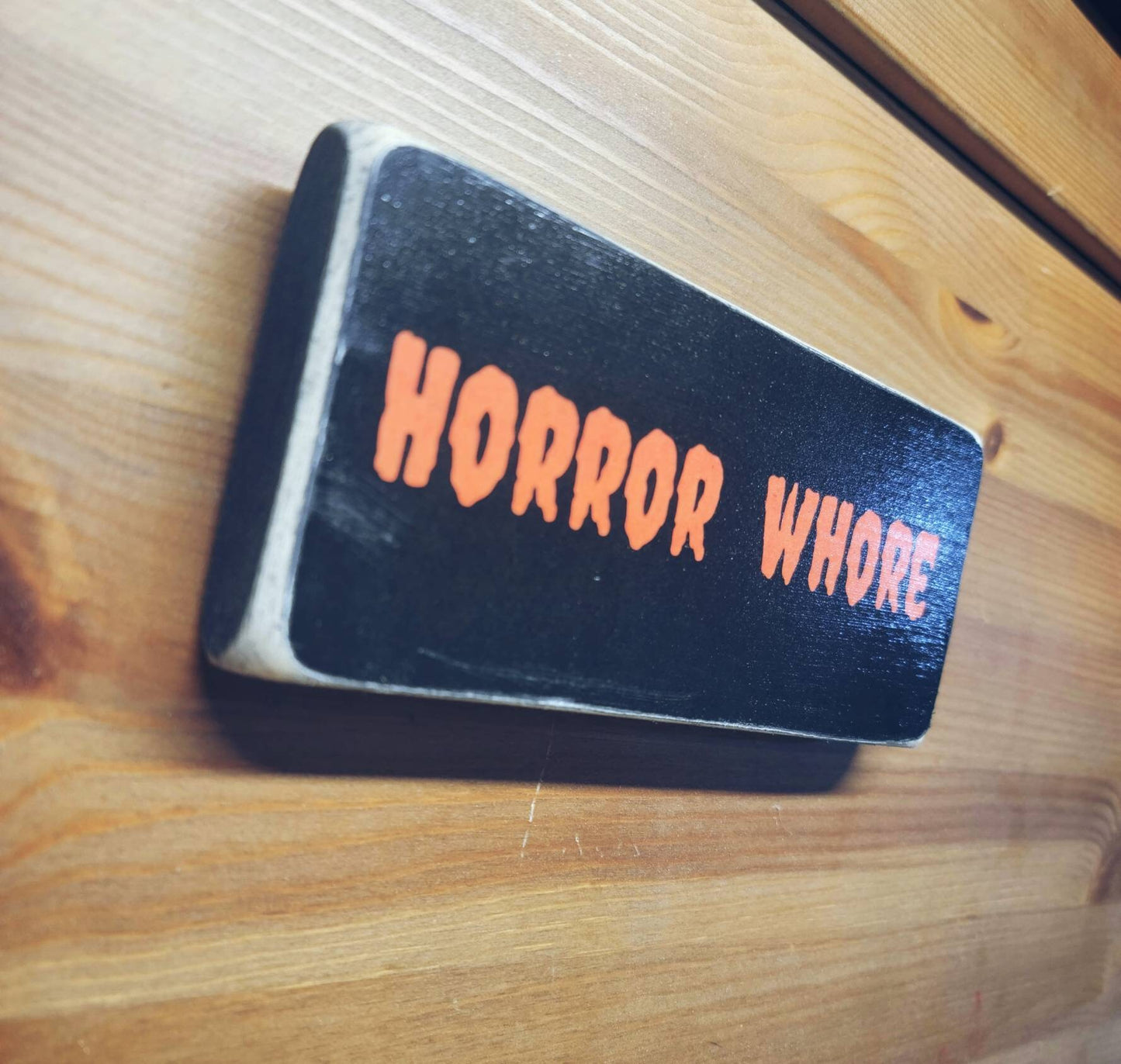 Horror who*e box sign