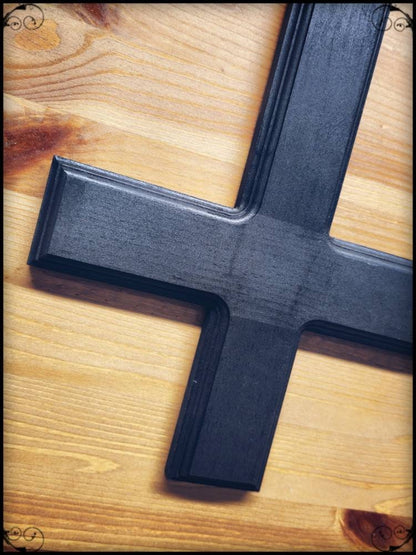 Black inverted cross