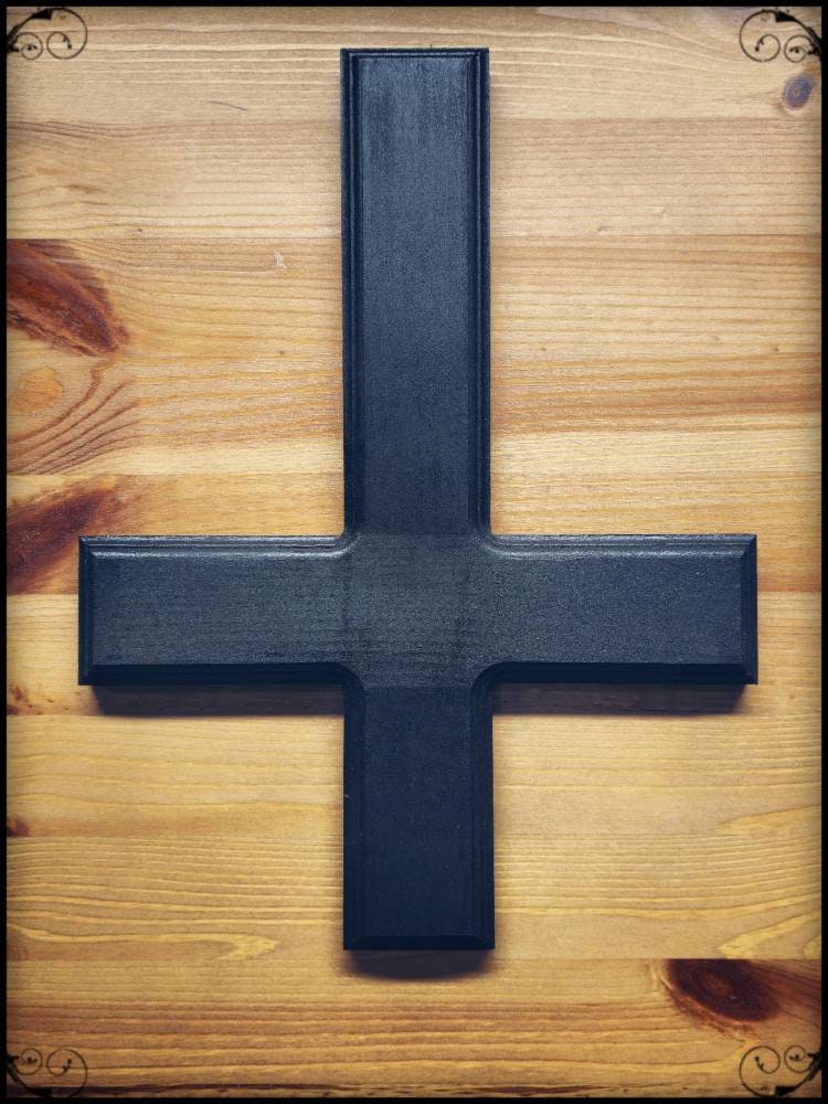 Black inverted cross