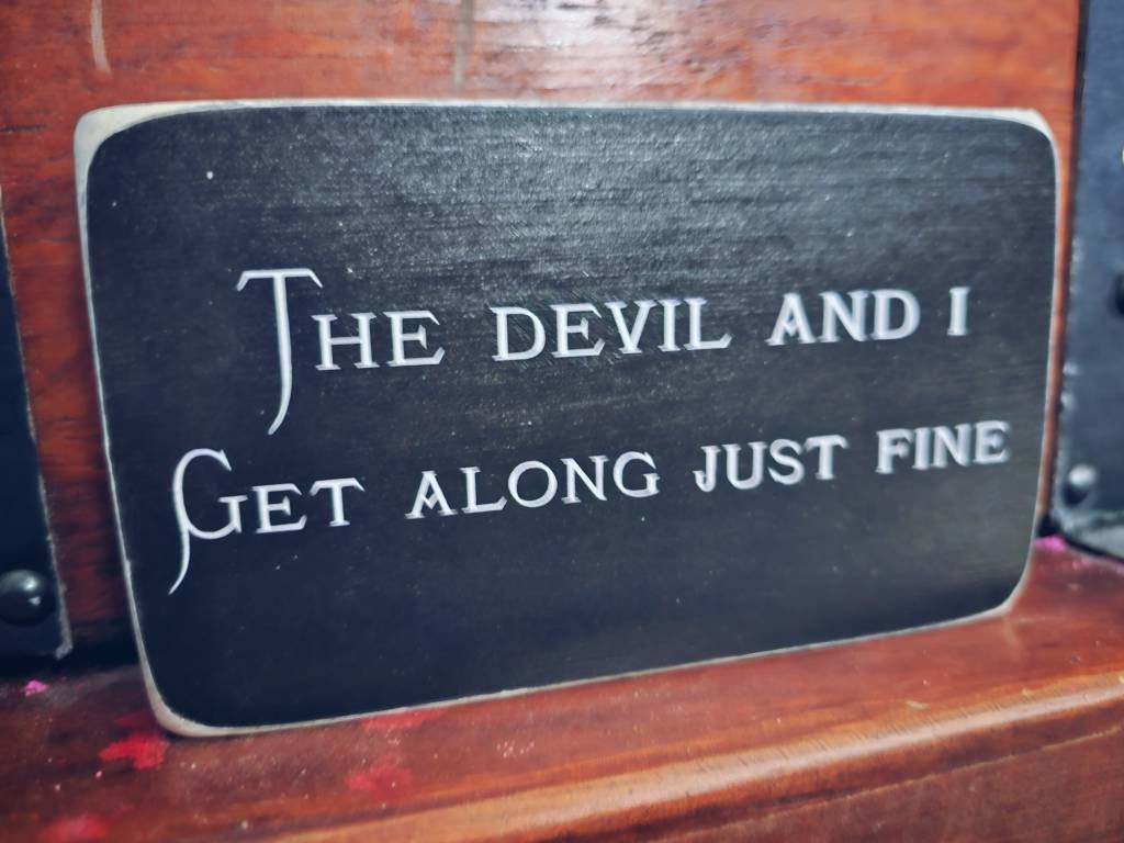 The devil and I box sign