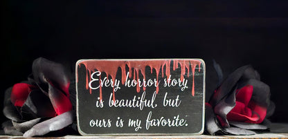 Every horror story box sign